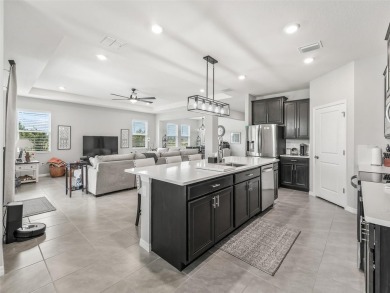 Experience luxury, flexibility, and privacy in this stunning and on Trilogy at Ocala Preserve in Florida - for sale on GolfHomes.com, golf home, golf lot
