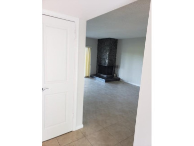 This spacious and beautiful end unit townhome has recently been on Palm-Aire Country Club and Resort - Palms in Florida - for sale on GolfHomes.com, golf home, golf lot