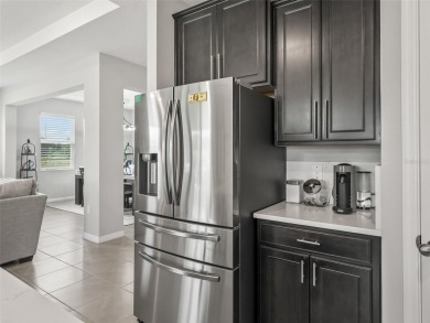 Experience luxury, flexibility, and privacy in this stunning and on Trilogy at Ocala Preserve in Florida - for sale on GolfHomes.com, golf home, golf lot