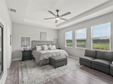 Experience luxury, flexibility, and privacy in this stunning and on Trilogy at Ocala Preserve in Florida - for sale on GolfHomes.com, golf home, golf lot