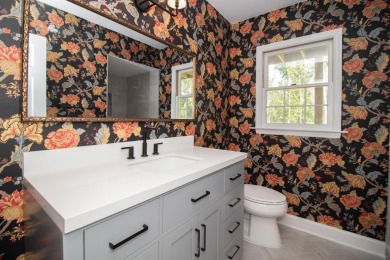 Welcome to this stunning brick home, thoughtfully renovated from on West Lake Country Club in Georgia - for sale on GolfHomes.com, golf home, golf lot