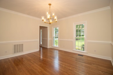 Welcome to this stunning brick home, thoughtfully renovated from on West Lake Country Club in Georgia - for sale on GolfHomes.com, golf home, golf lot