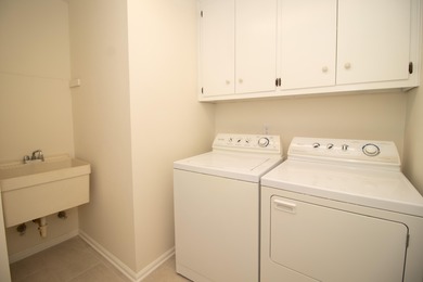 Welcome to this stunning brick home, thoughtfully renovated from on West Lake Country Club in Georgia - for sale on GolfHomes.com, golf home, golf lot