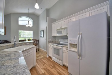 Welcome to 2350 Paulette Dr, a beautifully maintained and fully on Southern Dunes Golf and Country Club in Florida - for sale on GolfHomes.com, golf home, golf lot