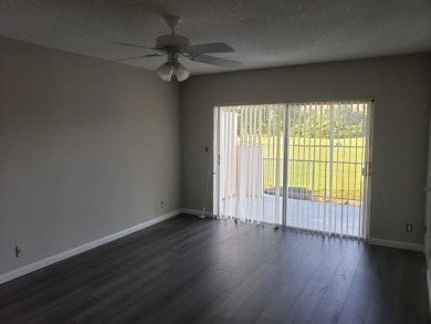 This spacious and beautiful end unit townhome has recently been on Palm-Aire Country Club and Resort - Palms in Florida - for sale on GolfHomes.com, golf home, golf lot