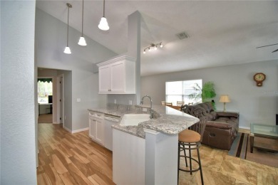 Welcome to 2350 Paulette Dr, a beautifully maintained and fully on Southern Dunes Golf and Country Club in Florida - for sale on GolfHomes.com, golf home, golf lot