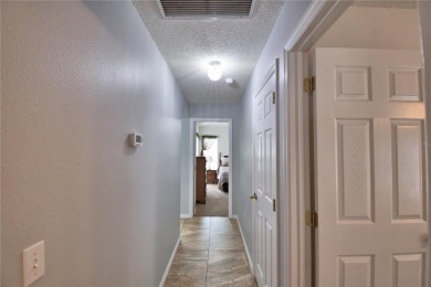 Welcome to 2350 Paulette Dr, a beautifully maintained and fully on Southern Dunes Golf and Country Club in Florida - for sale on GolfHomes.com, golf home, golf lot