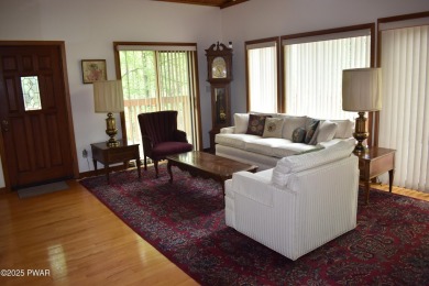 CUSTOM CEDAR RETREAT IN HEMLOCK FARMS. Discover this beautifully on Lords Valley Country Club, Inc in Pennsylvania - for sale on GolfHomes.com, golf home, golf lot