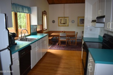 CUSTOM CEDAR RETREAT IN HEMLOCK FARMS. Discover this beautifully on Lords Valley Country Club, Inc in Pennsylvania - for sale on GolfHomes.com, golf home, golf lot