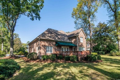 This is a beautiful brick home with loads of curb appeal in the on Litchfield Country Club in South Carolina - for sale on GolfHomes.com, golf home, golf lot