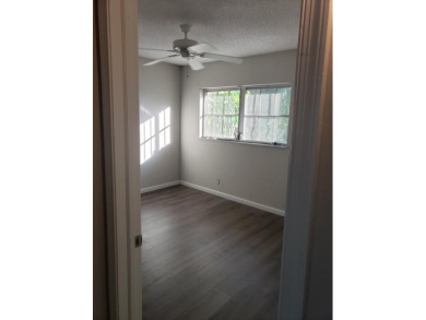 This spacious and beautiful end unit townhome has recently been on Palm-Aire Country Club and Resort - Palms in Florida - for sale on GolfHomes.com, golf home, golf lot