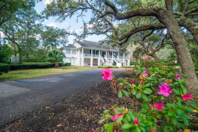 This is a beautiful brick home with loads of curb appeal in the on Litchfield Country Club in South Carolina - for sale on GolfHomes.com, golf home, golf lot