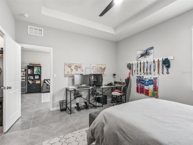 Experience luxury, flexibility, and privacy in this stunning and on Trilogy at Ocala Preserve in Florida - for sale on GolfHomes.com, golf home, golf lot