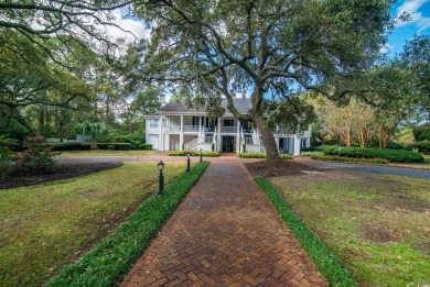 This is a beautiful brick home with loads of curb appeal in the on Litchfield Country Club in South Carolina - for sale on GolfHomes.com, golf home, golf lot