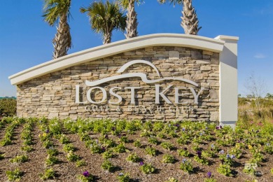 EXPERIENCE TRUE LOST KEY LIVING IN THIS 3 BEDROOM, 2 BATHROOM on Lost Key Golf Club in Florida - for sale on GolfHomes.com, golf home, golf lot