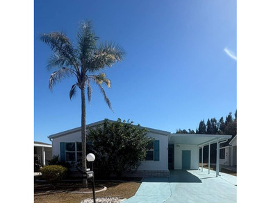 So much to love in this beautifully furnished 3-bed, 2-bath home on Sabal Springs Golf and Racquet Club in Florida - for sale on GolfHomes.com, golf home, golf lot