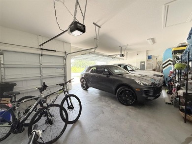 Experience luxury, flexibility, and privacy in this stunning and on Trilogy at Ocala Preserve in Florida - for sale on GolfHomes.com, golf home, golf lot