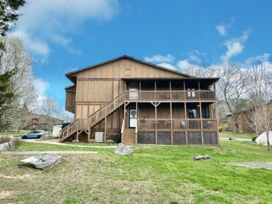 Discover lakeside living in this beautiful lower level condo for on Woodson Bend Resort in Kentucky - for sale on GolfHomes.com, golf home, golf lot