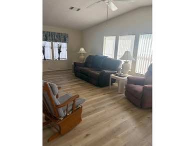 So much to love in this beautifully furnished 3-bed, 2-bath home on Sabal Springs Golf and Racquet Club in Florida - for sale on GolfHomes.com, golf home, golf lot