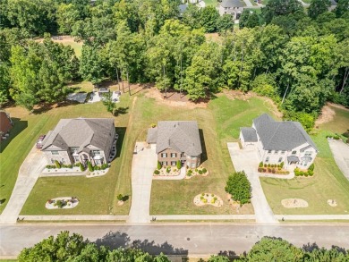 Experience elegance in this 2019-built, 5-bedroom, 3-bathroom on Crystal Lake Golf and Country Club in Georgia - for sale on GolfHomes.com, golf home, golf lot