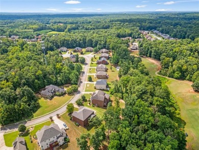 Experience elegance in this 2019-built, 5-bedroom, 3-bathroom on Crystal Lake Golf and Country Club in Georgia - for sale on GolfHomes.com, golf home, golf lot