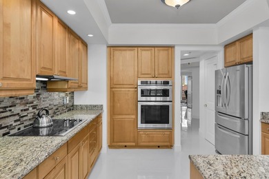 Step into luxury with this beautifully furnished 3-bedroom, 3 on Hammock Bay in Florida - for sale on GolfHomes.com, golf home, golf lot