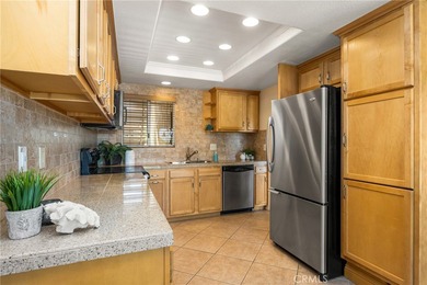 Welcome to this lovely 2 BD 2 BA Castilla model in the on Laguna Woods Village Golf Course in California - for sale on GolfHomes.com, golf home, golf lot