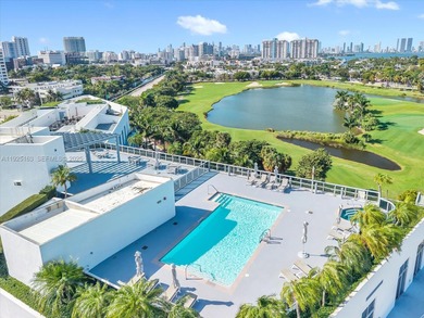 Extra-large loft-style studio at 2001 Meridian Ave with 12-ft on Miami Beach Golf Club in Florida - for sale on GolfHomes.com, golf home, golf lot