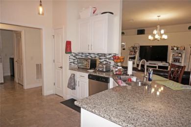 Impressive 4 Bedroom, 3 Bathroom home with attached 3 Car Garage on Deep Creek Golf Club in Florida - for sale on GolfHomes.com, golf home, golf lot
