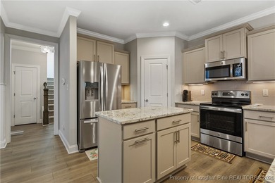 This beautifully maintained residence offers a refined on Anderson Creek Golf Club in North Carolina - for sale on GolfHomes.com, golf home, golf lot