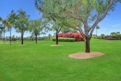 Golf course views fill this charming 2-story home of 4 bedrooms on Woodfield Country Club in Florida - for sale on GolfHomes.com, golf home, golf lot