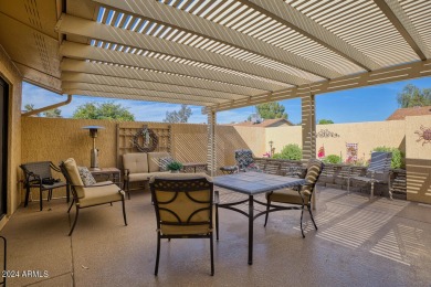 Discover luxurious living in this stunning Pueblo end unit on Pebblebrook Golf Course in Arizona - for sale on GolfHomes.com, golf home, golf lot