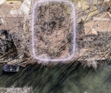 This .33 acre lakefront lot is an ideal property for your very on Druid Hills Golf Club in Tennessee - for sale on GolfHomes.com, golf home, golf lot