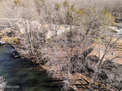 This .33 acre lakefront lot is an ideal property for your very on Druid Hills Golf Club in Tennessee - for sale on GolfHomes.com, golf home, golf lot