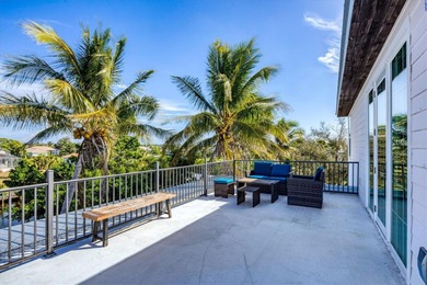 Experience unparalleled coastal living in this 2019 custom-built on Rotonda Golf and Country Club The Links Course in Florida - for sale on GolfHomes.com, golf home, golf lot
