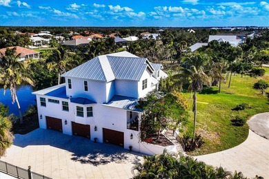 Experience unparalleled coastal living in this 2019 custom-built on Rotonda Golf and Country Club The Links Course in Florida - for sale on GolfHomes.com, golf home, golf lot