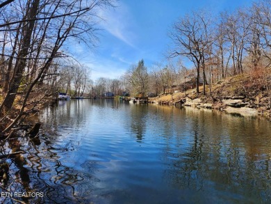 This .33 acre lakefront lot is an ideal property for your very on Druid Hills Golf Club in Tennessee - for sale on GolfHomes.com, golf home, golf lot