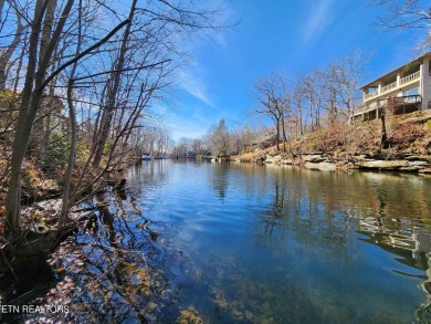 This .33 acre lakefront lot is an ideal property for your very on Druid Hills Golf Club in Tennessee - for sale on GolfHomes.com, golf home, golf lot