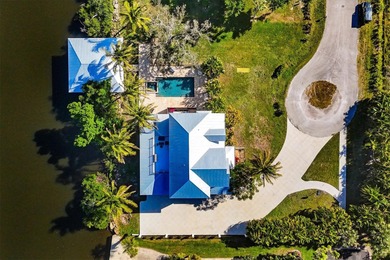 Experience unparalleled coastal living in this 2019 custom-built on Rotonda Golf and Country Club The Links Course in Florida - for sale on GolfHomes.com, golf home, golf lot