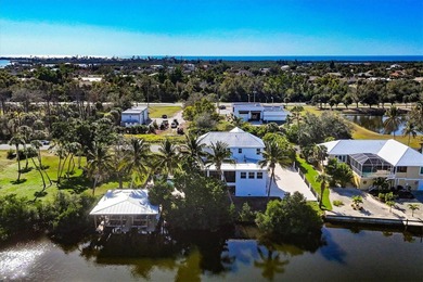 Experience unparalleled coastal living in this 2019 custom-built on Rotonda Golf and Country Club The Links Course in Florida - for sale on GolfHomes.com, golf home, golf lot