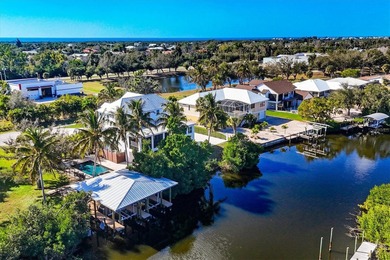 Experience unparalleled coastal living in this 2019 custom-built on Rotonda Golf and Country Club The Links Course in Florida - for sale on GolfHomes.com, golf home, golf lot