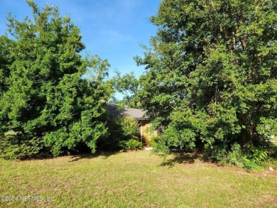 Sturdy brick ranch home with side entry garage.  Located on on Keystone Heights Golf and Country Club in Florida - for sale on GolfHomes.com, golf home, golf lot