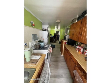 Rarely available income producing property in great Morehead on Brandywine Bay Golf Club in North Carolina - for sale on GolfHomes.com, golf home, golf lot