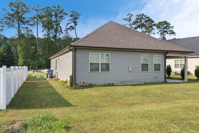 Welcome to this inviting ranch-style home, perfectly situated in on The Golf Club At Rocky Mount in North Carolina - for sale on GolfHomes.com, golf home, golf lot