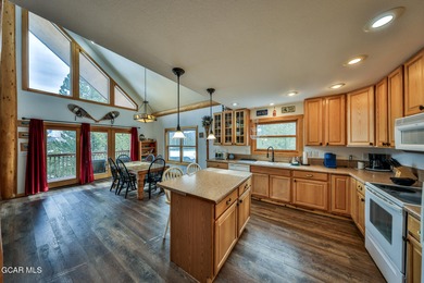 Ideally located just steps from the clubhouse, private lake, and on Grand Lake Golf Course in Colorado - for sale on GolfHomes.com, golf home, golf lot