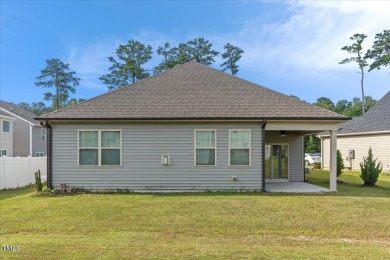 Welcome to this inviting ranch-style home, perfectly situated in on The Golf Club At Rocky Mount in North Carolina - for sale on GolfHomes.com, golf home, golf lot