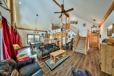 Ideally located just steps from the clubhouse, private lake, and on Grand Lake Golf Course in Colorado - for sale on GolfHomes.com, golf home, golf lot