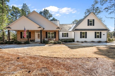 Discover this lovely 4 bedroom, 3.5 bathroom home located inside on Seven Lakes Country Club in North Carolina - for sale on GolfHomes.com, golf home, golf lot
