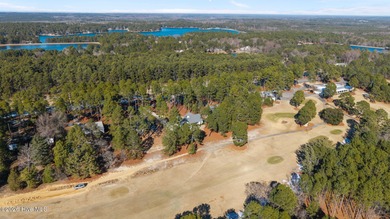 Discover this lovely 4 bedroom, 3.5 bathroom home located inside on Seven Lakes Country Club in North Carolina - for sale on GolfHomes.com, golf home, golf lot