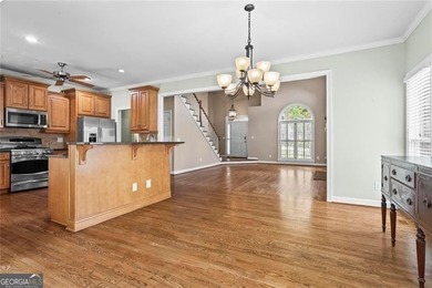 Downsize without Compromise!  Fabulous light bright open floor on The Golf Club of Georgia in Georgia - for sale on GolfHomes.com, golf home, golf lot